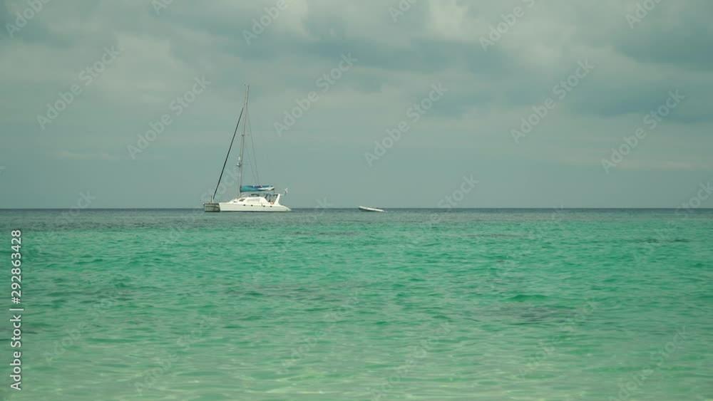 Large private motor yacht at sea against the sky and clouds. Large private motor yacht at sea against the sky and clouds.