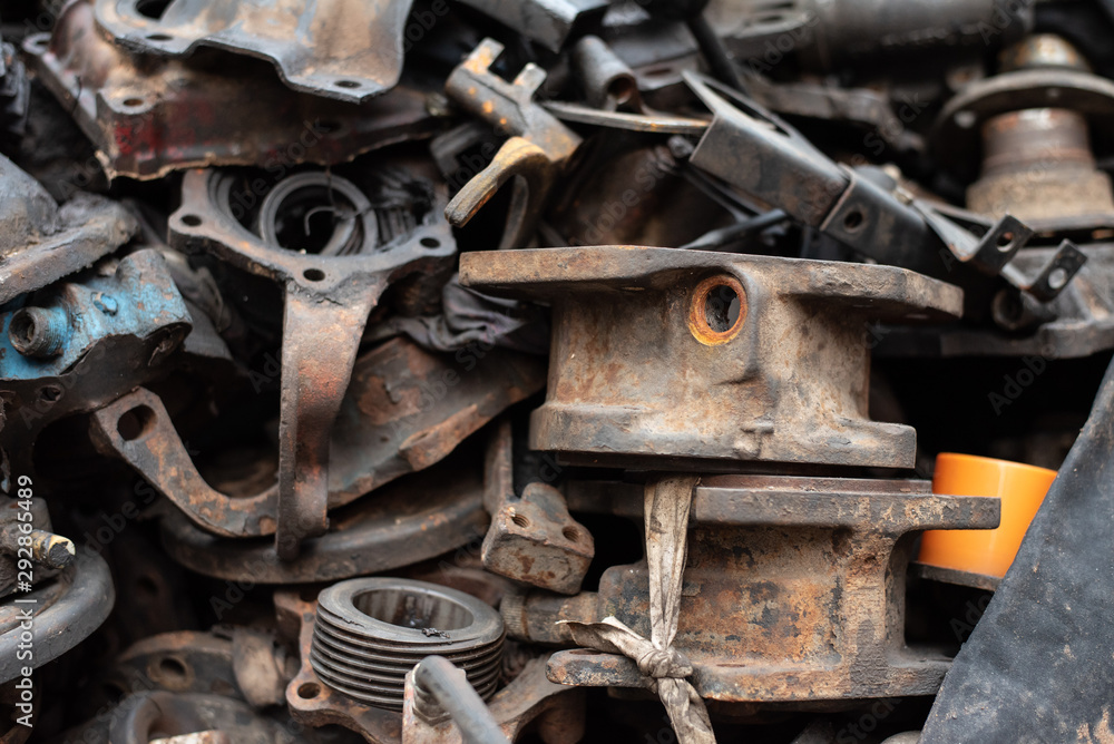 Old engine parts, steel and used car parts, for engineering. Selective focus. Old engine parts, steel and used car parts, for engineering. Selective focus.