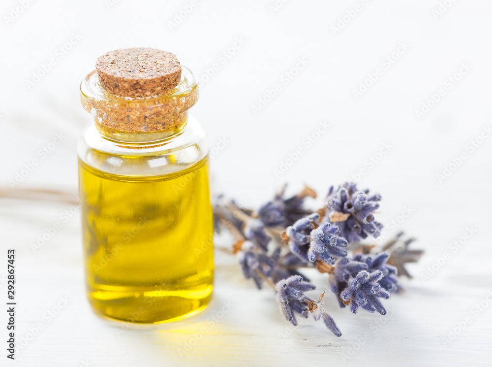 Wellness treatments with lavender flowers on wooden table. Spa still-life. Wellness treatments with lavender flowers on wooden table. Spa still-life.