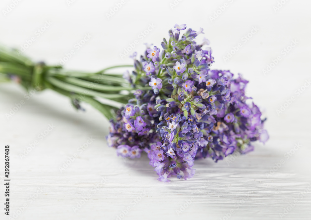 Wellness treatments with lavender flowers on wooden table. Spa still-life. Wellness treatments with lavender flowers on wooden table. Spa still-life.