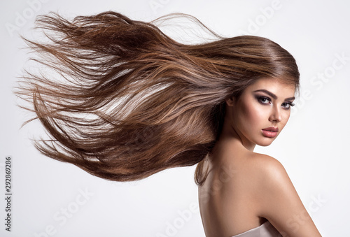 Portrait of a beautiful woman with a long hair.
