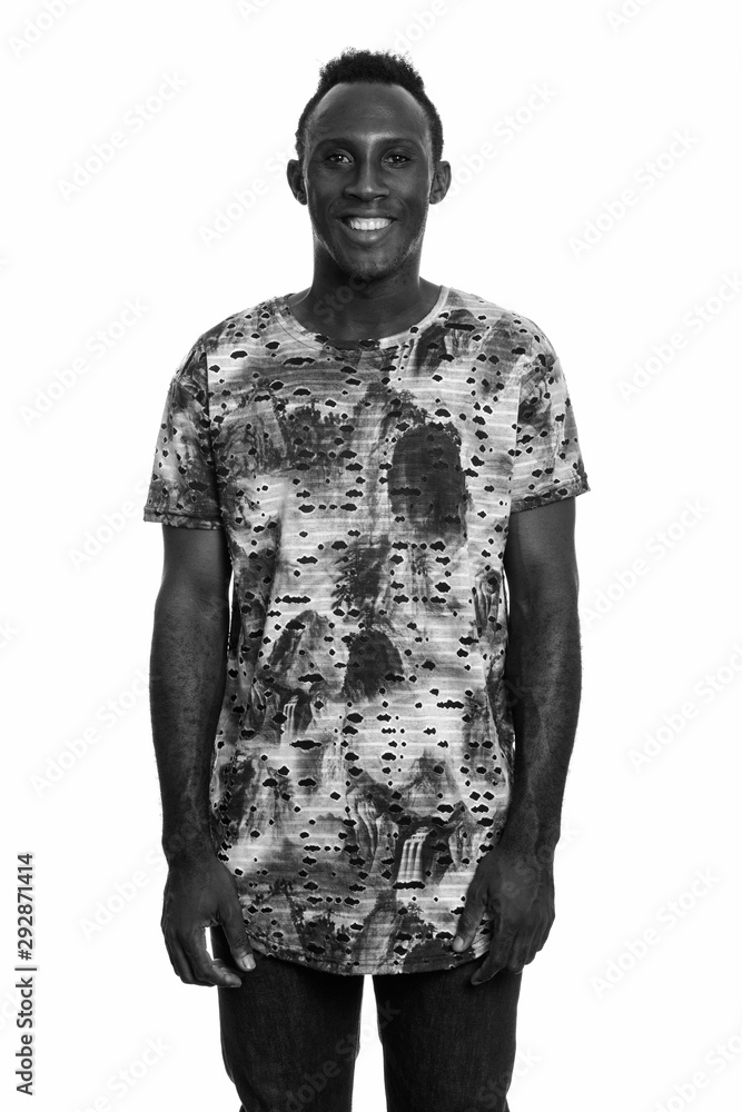 Studio shot of young African man in black and white