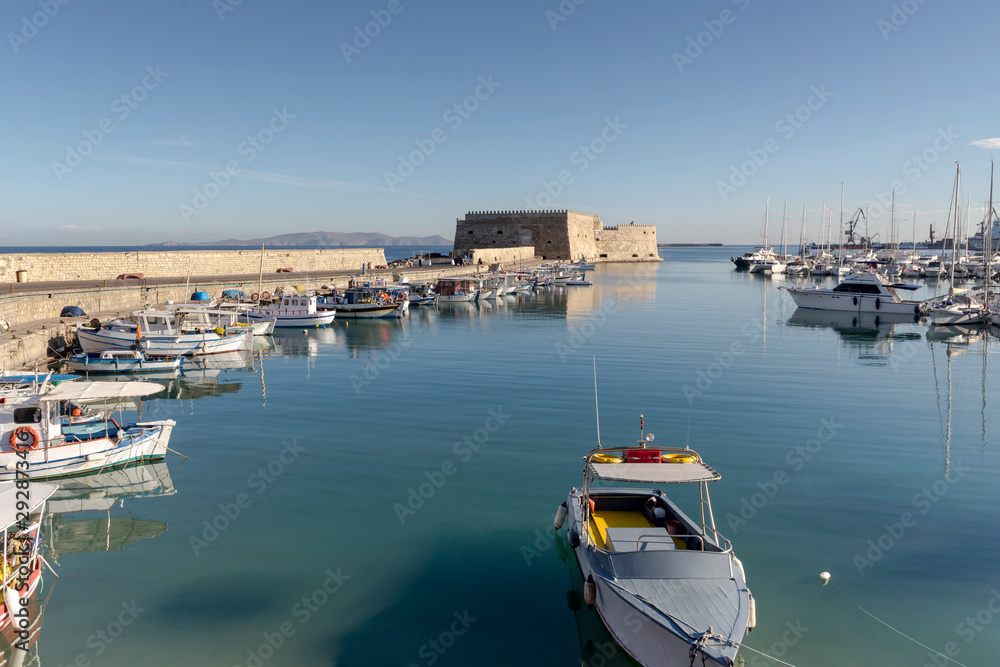 Fortress and boats in the morning (Greece, Crete)