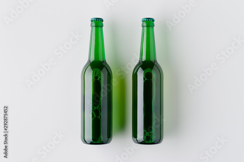 Top view of two beer bottles mockup.