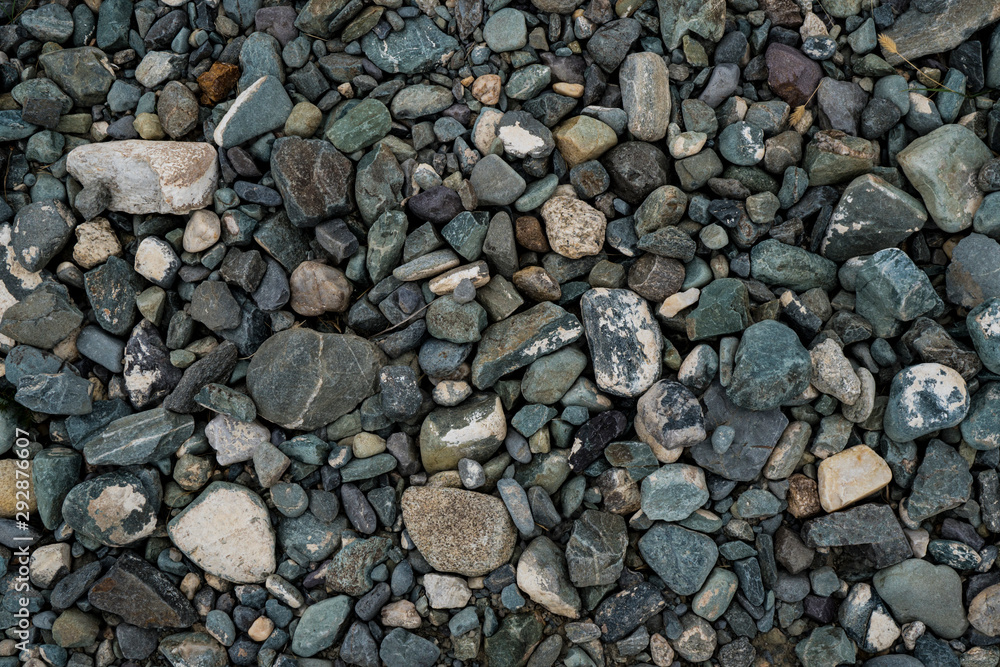 The texture of a shallow river stone. Pebble Background Image The texture of a shallow river stone. Pebble Background Image