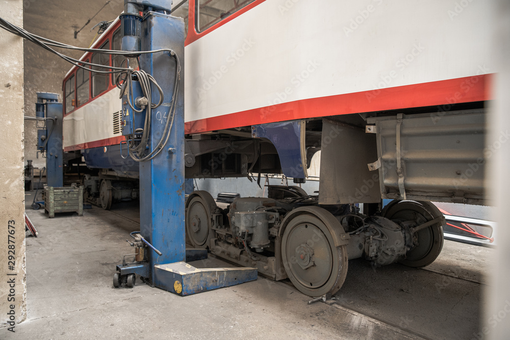 repair of tram in depot. garage equipped for service and repair of public transport repair of tram in depot. garage equipped for service and repair of public transport