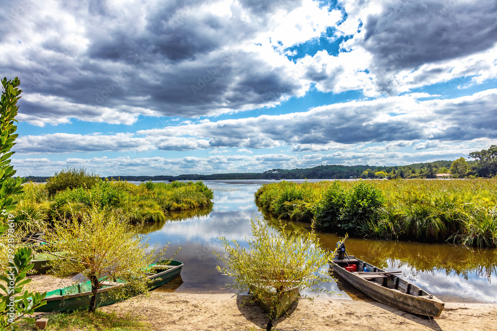 Fototapeta premium Seignosse, Landes, France - View of boats in front of Hardy Pond