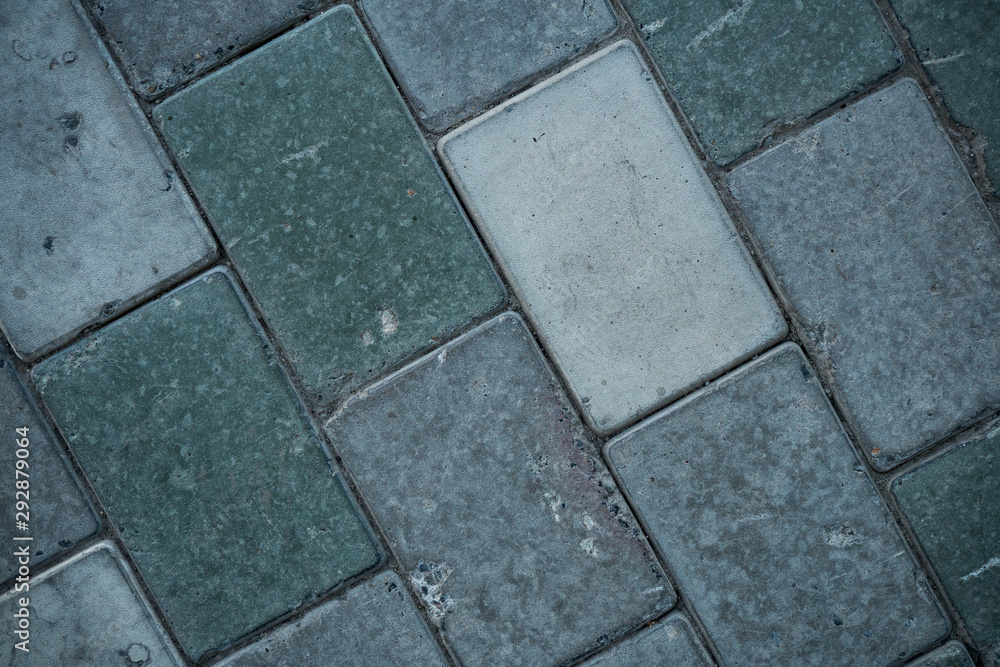 Texture of paving slabs. Background image of a stratum stone Texture of paving slabs. Background image of a stratum stone