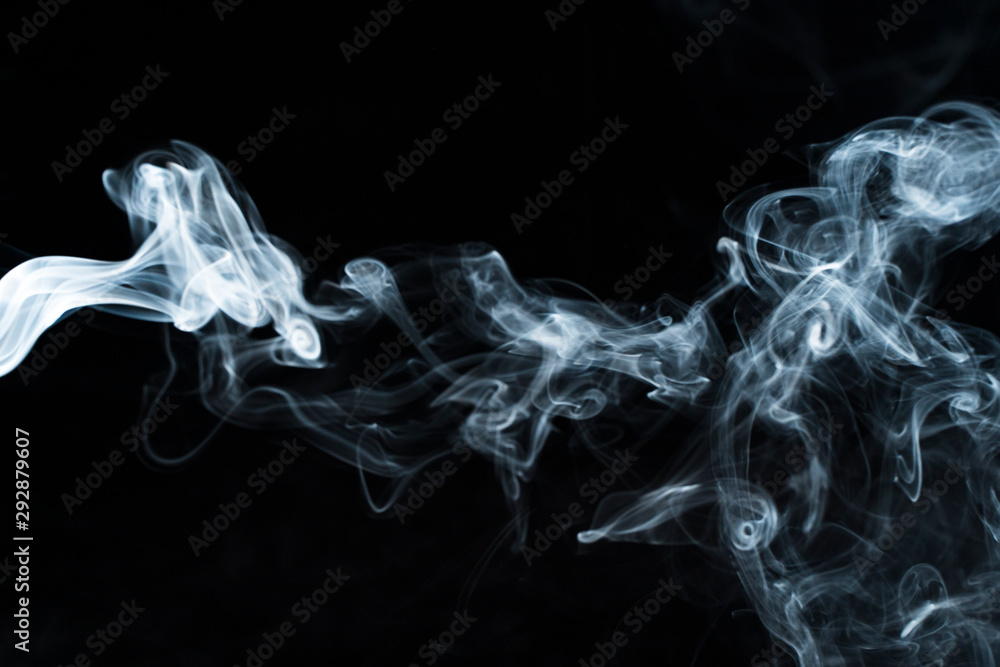 Fototapeta premium Photo of a wisp of smoke on a dark background