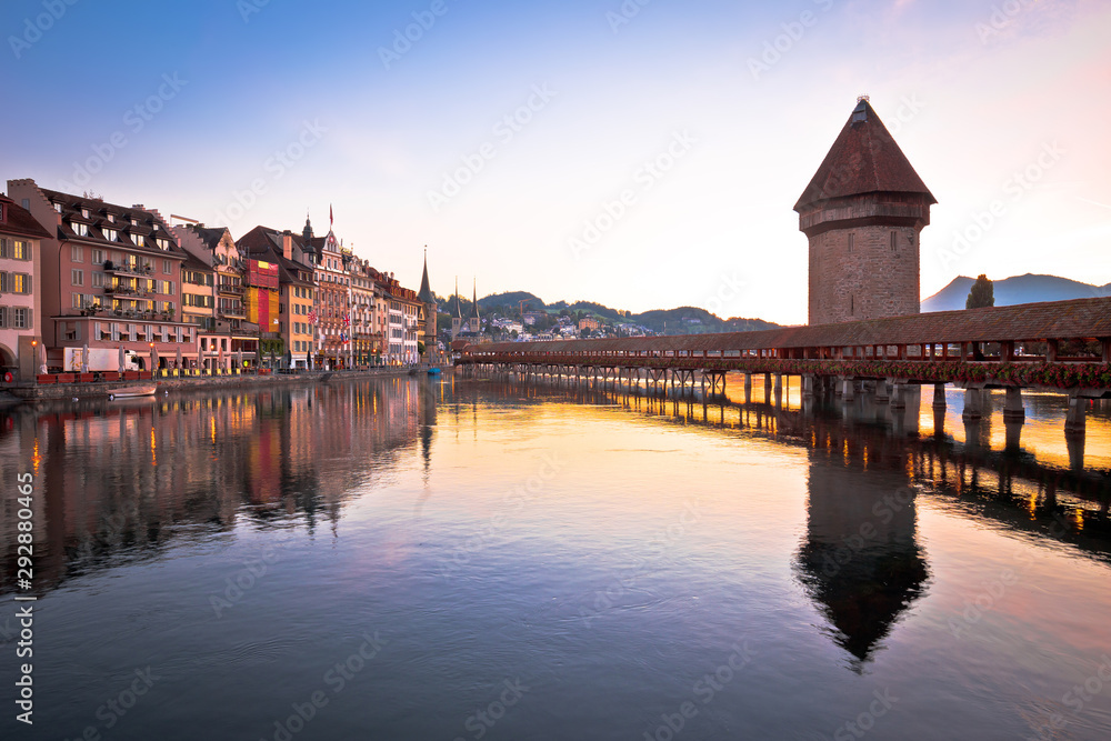 Luzern wooden Chapel Bridge and tower dawn view