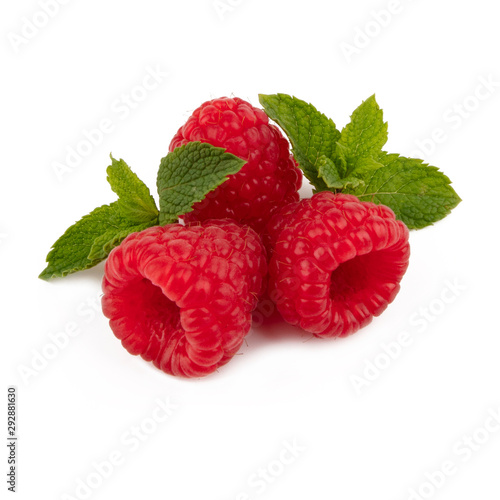 Isolated berries. Three raspberry fruits isolated on white background with green leaves