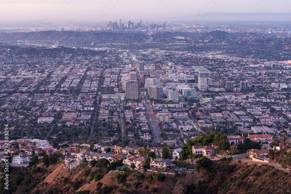 Twilight cityscape view of hilltop homes and downtown Glendale near Los Angeles and Burbank in Southern California.