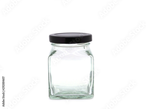  Empty glass food storage jar isolated on white background.