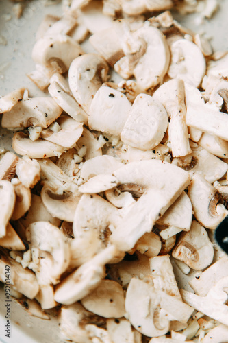  Cooking and slicing mushrooms. Content and macro photography for food blog.