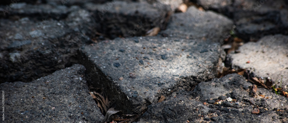 Background from pieces of damaged asphalt Background from pieces of damaged asphalt