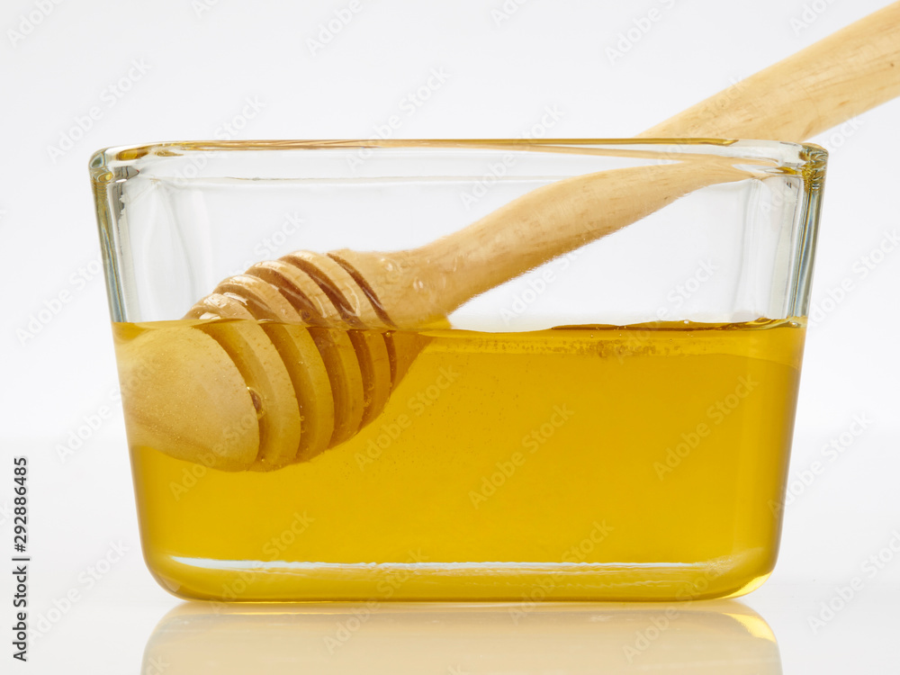 honey and wooden stick honey and wooden stick