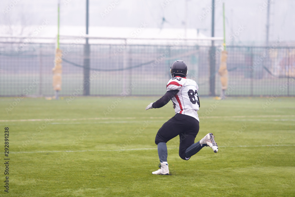 American football player running on the field