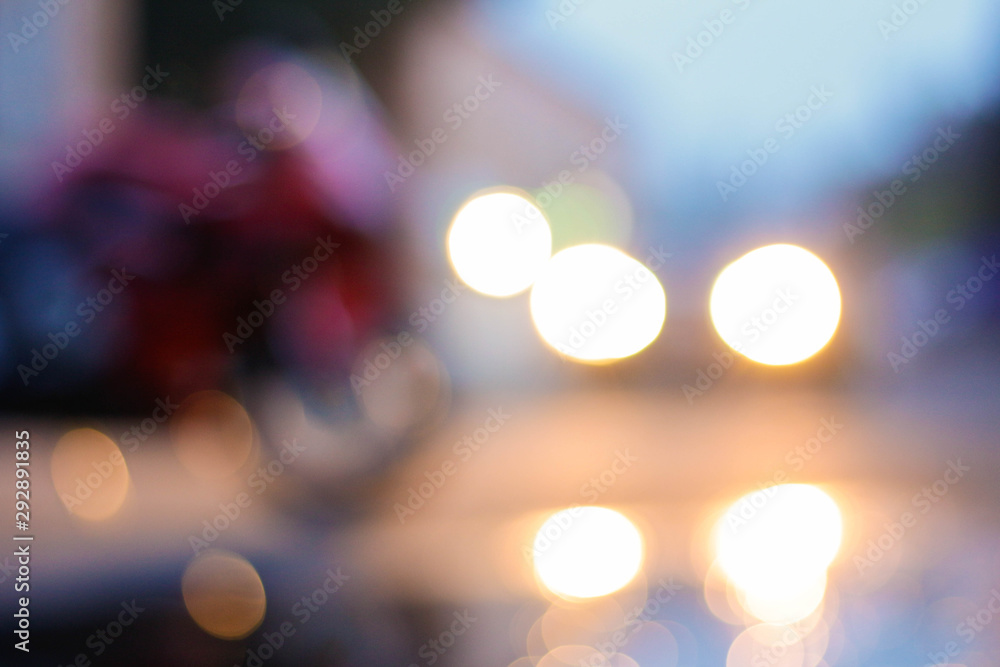 Beautiful blurred image with car headlights Beautiful blurred image with car headlights
