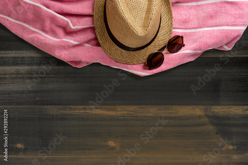 Hat and towel. Top view. Summer holiday concept element. Isolated on white background.