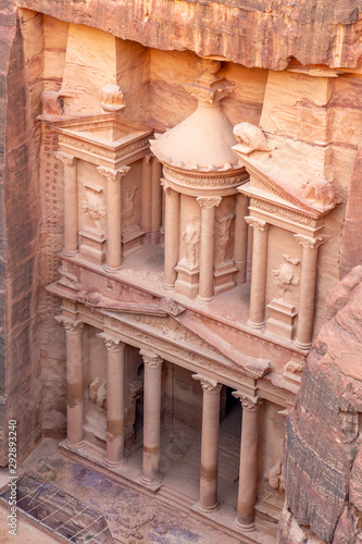 Al Khazneh. It is the treasury in Petra ancient city. Petra is the main attraction of Jordan. Petra is included in the UNESCO heritage list.