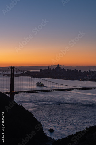 Golden Gate bridge in silhouette with a cruise ship coming into the San Francisco  bay area  © Larry D Crain