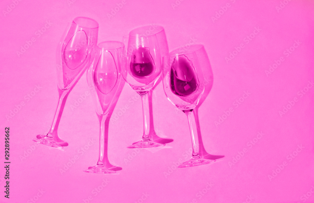 Glasses of wine and champagne. The pink colour. Bright fuchsia. Glasses of wine and champagne. The pink colour. Bright fuchsia.