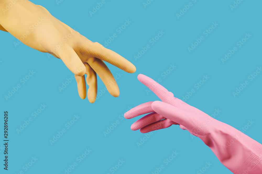 Hands of people in colorful rubber gloves reaching out for each other