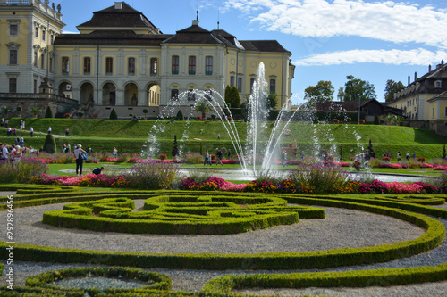 Water fountain with baroque garden in the background photo