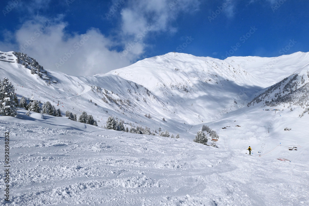 Winter mountains and ski slope in Zillertal Valley in Tyrol.