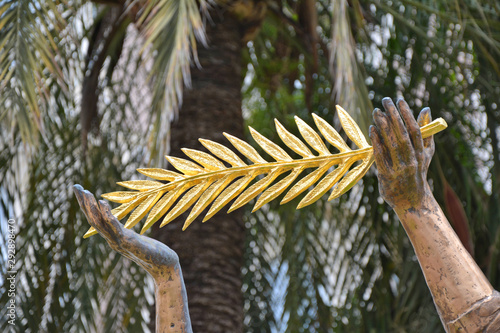 The sculpture with golden palm in Cannes photo