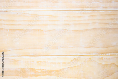 White toned wooden board top view photo. White wood texture. Rustic timber table top view. Polished wood backdrop