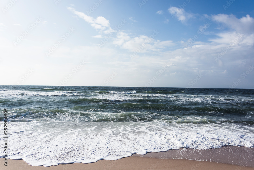 View of beach and clouds