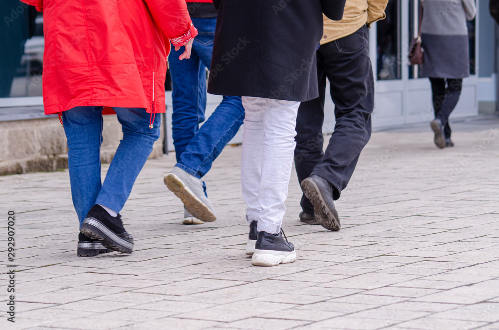 Men and women on a walk. Break and rest. Hockey fans. Men and women on a walk. Break and rest. Hockey fans.