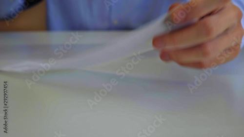 Man tearing apart a contract. 4k (UHD)