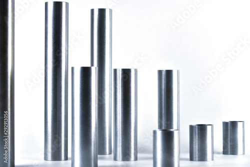 Metal cylinders in a row.