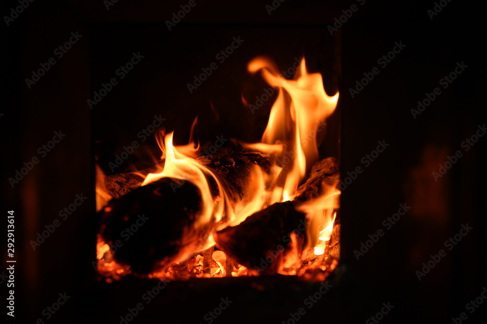 Obraz premium blurred burning coals in the stove