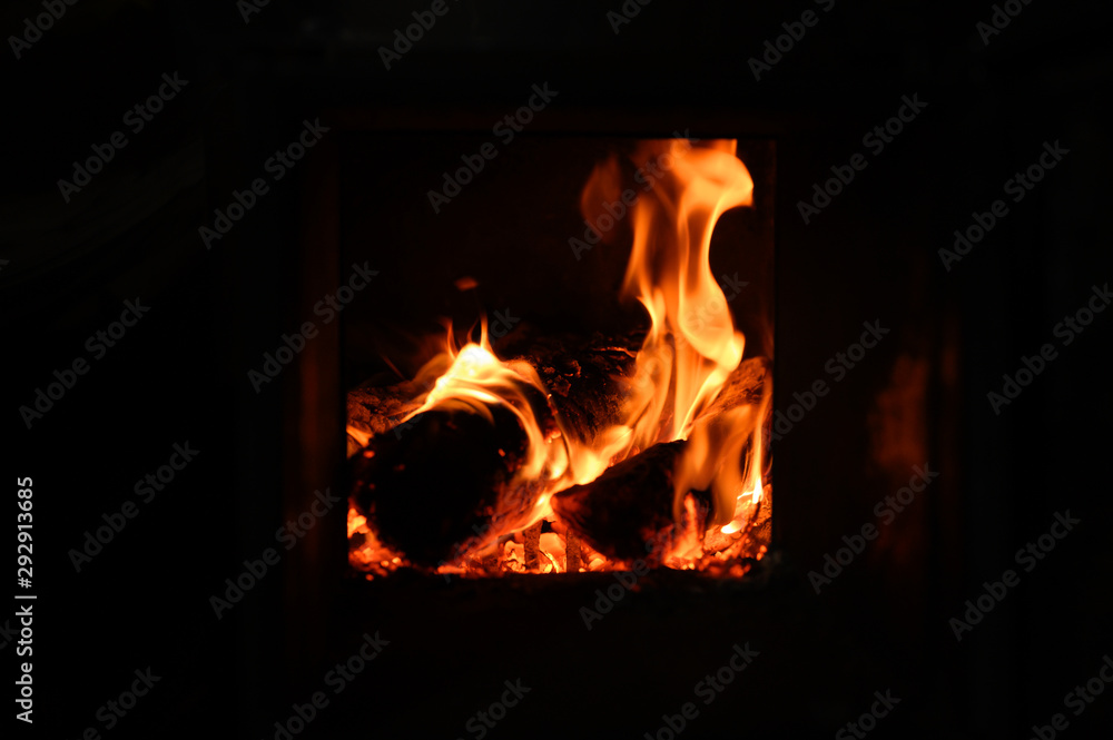 Fototapeta premium blurred burning coals in the stove