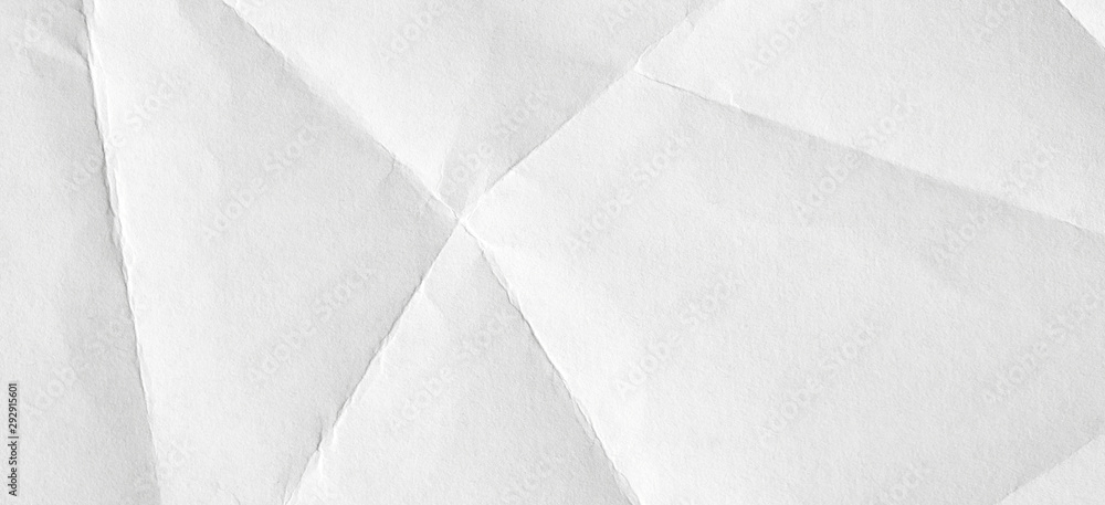 Obraz premium The background is white with an old surface, with cracks and kinks. Texture of paper in retro style, crumple.