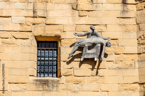 San Sebastian, Spain -  Sculpture of José Ramon Anda on the facade of San Vicente Church photo