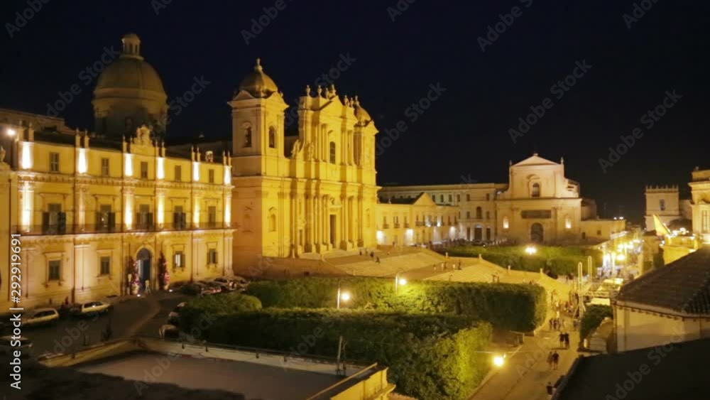 Panoramic night view of the Baroque old town of Noto, with Palazzo Ducezio and the cathedral, in Sicily Italy. Panoramic night view of the Baroque old town of Noto, with Palazzo Ducezio and the cathedral, in Sicily Italy.