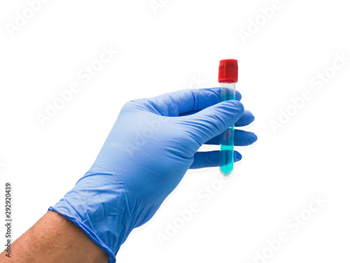 Closeup hand of a lab technician holding blood tube test on white background / laboratory technician holding a blood tube test