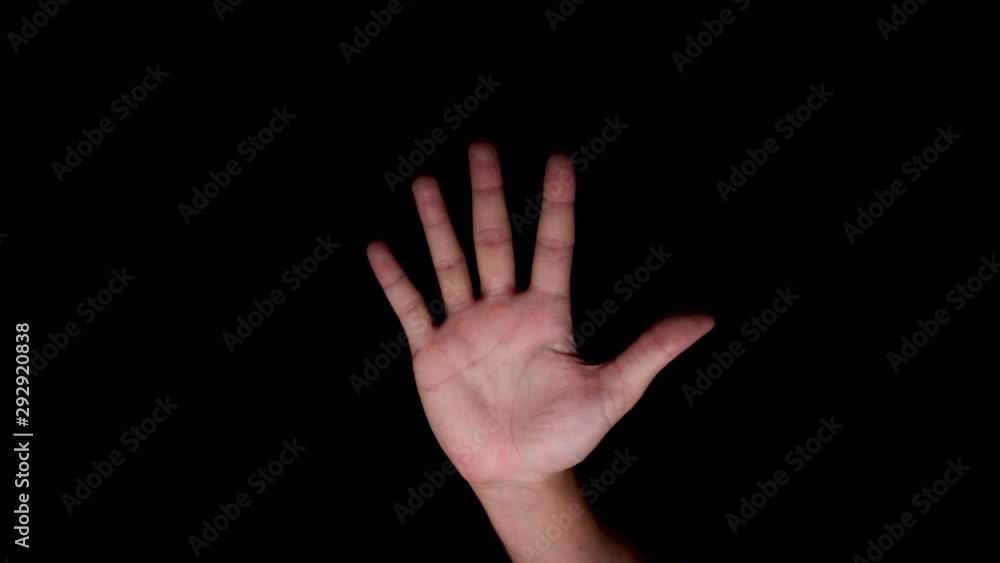 Caucasian Hand Coming Up And Showing Number Five Sign Isolated On Black background. Close up potrait shot. Caucasian Hand Coming Up And Showing Number Five Sign Isolated On Black background. Close up potrait shot.
