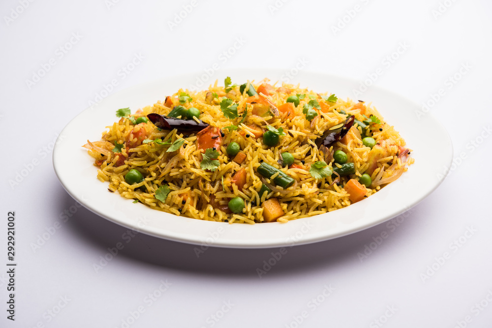 Tawa Pulao/Pulav/Pilaf/Pilau is an Indian Street Food made using basmati rice, vegetables and spices. Selective focus Tawa Pulao/Pulav/Pilaf/Pilau is an Indian Street Food made using basmati rice, vegetables and spices. Selective focus