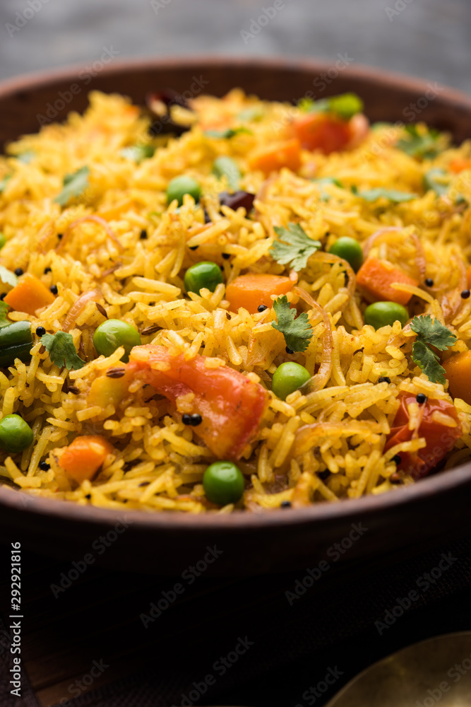 Tawa Pulao/Pulav/Pilaf/Pilau is an Indian Street Food made using basmati rice, vegetables and spices. Selective focus Tawa Pulao/Pulav/Pilaf/Pilau is an Indian Street Food made using basmati rice, vegetables and spices. Selective focus