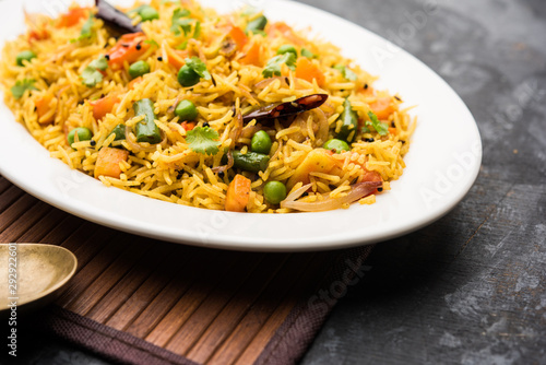 Tawa Pulao/Pulav/Pilaf/Pilau is an Indian Street Food made using basmati rice, vegetables and spices. Selective focus