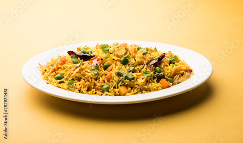 Tawa Pulao/Pulav/Pilaf/Pilau is an Indian Street Food made using basmati rice, vegetables and spices. Selective focus