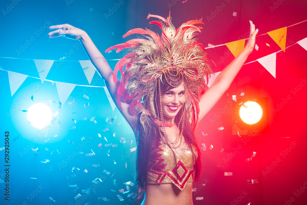 Αυτοκόλλητο Carnival, dancer and holiday concept - Beauty brunette woman in cabaret suit and headdress with natural feathers and rhinestones