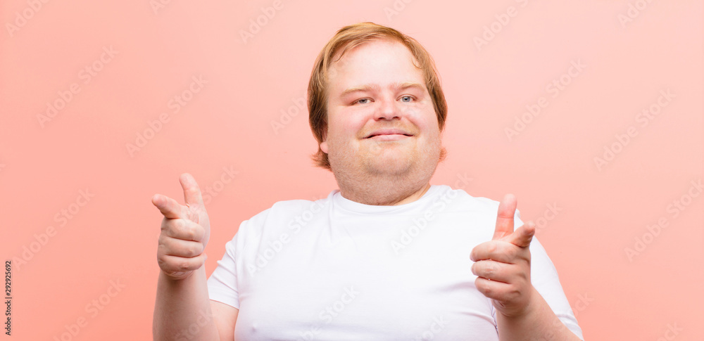 Ταπετσαρία young big size man feeling happy, cool, satisfied, relaxed and successful, point