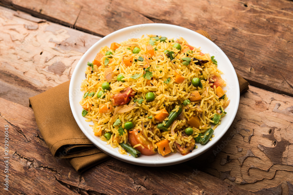 Tawa Pulao/Pulav/Pilaf/Pilau is an Indian Street Food made using basmati rice, vegetables and spices. Selective focus Tawa Pulao/Pulav/Pilaf/Pilau is an Indian Street Food made using basmati rice, vegetables and spices. Selective focus
