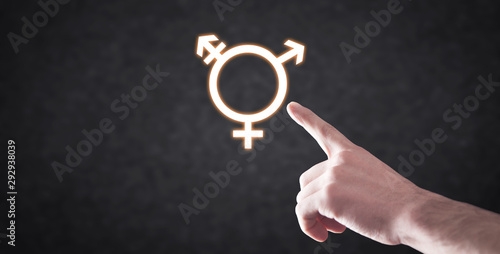 Male hand pointing or touching in Transgender symbol.